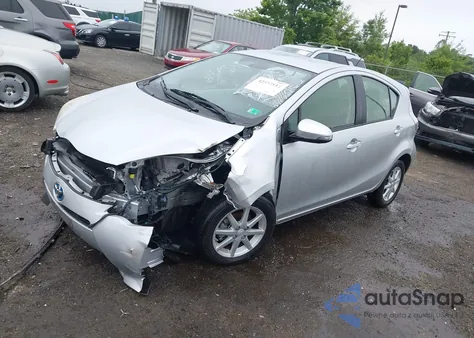 2014 Toyota Prius C Three from USA, damaged, VIN JTDKDTB30E1075790
